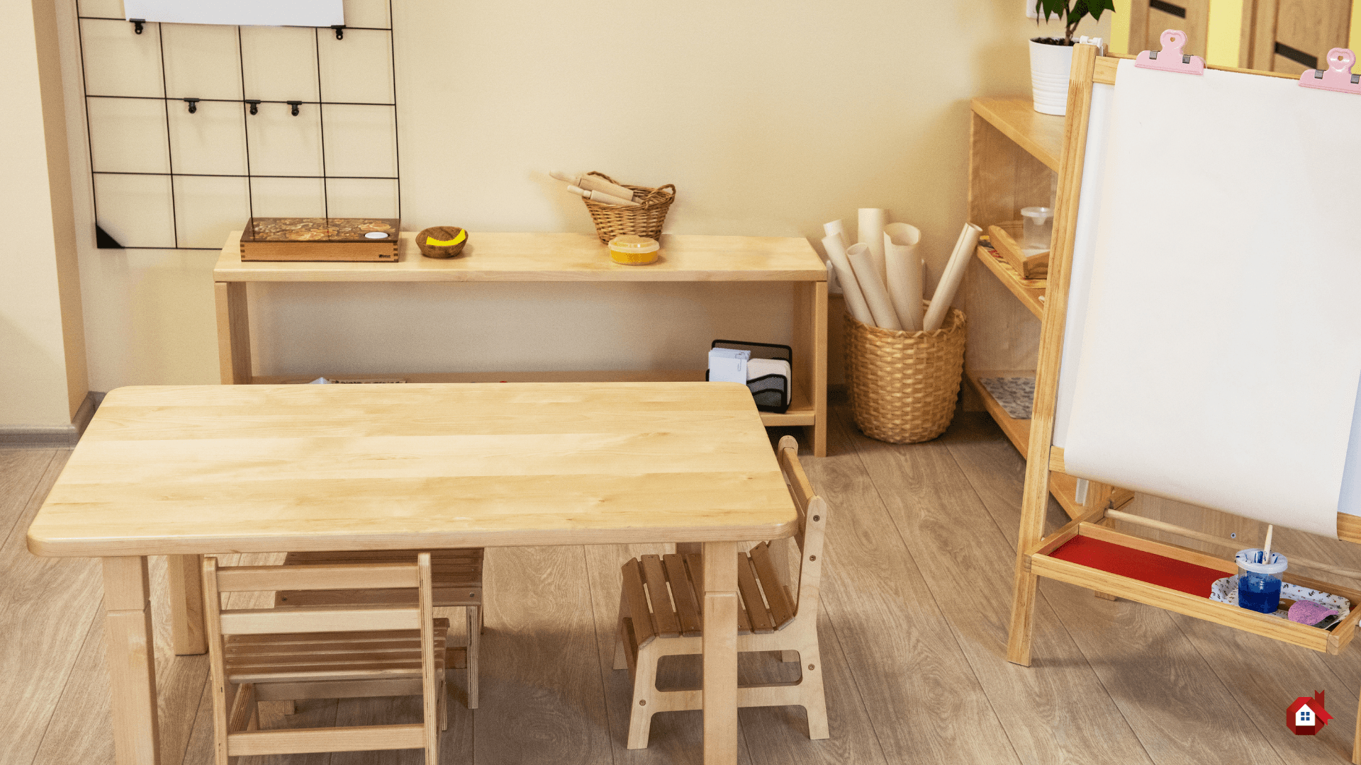 Coin d'activité Montessori avec table basse, étagères et chevalet